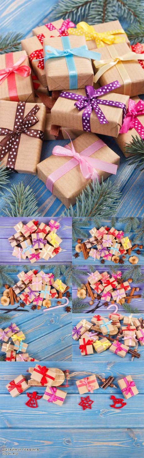 Photo Wooden sled and wrapped gifts with ribbons for Christmas or other celebration