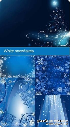 Белые снежинки на голубом фоне