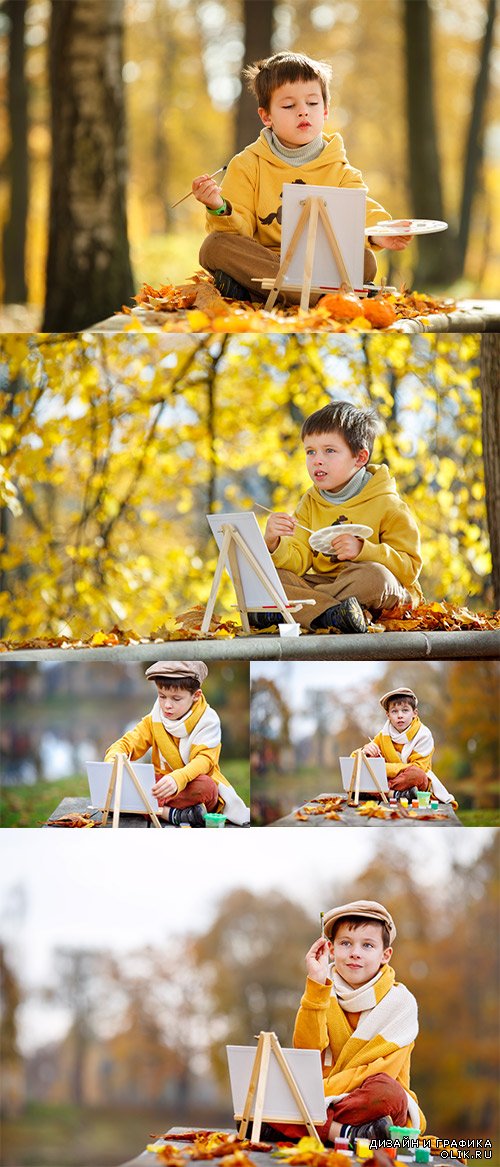 Little  boy draws autumn in the park