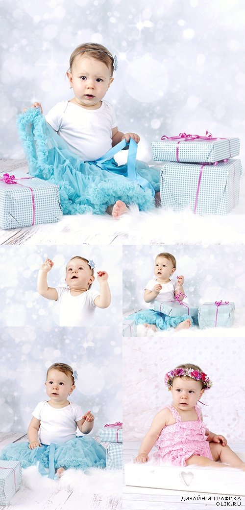 Little baby girl with christmas presents